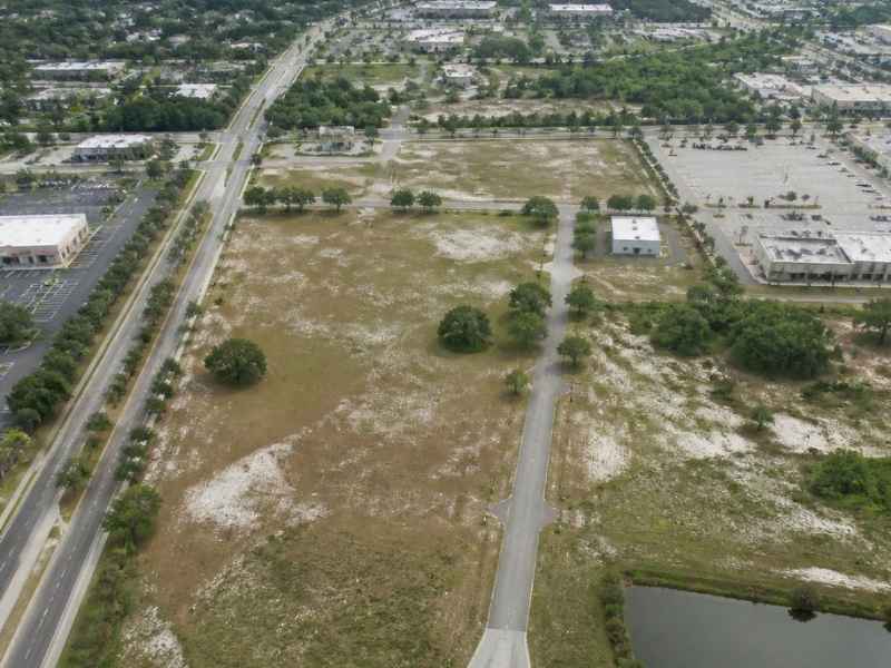 Aerial view of commercial land in Tampa showing multiple adjoining parcels for a commercial property surveyor review.